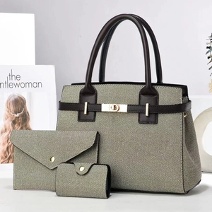 Detailed set of three woven handbags with dark brown leather trim and golden hardware