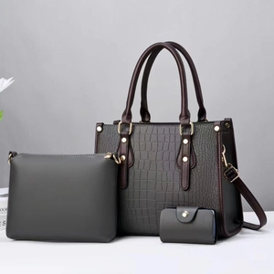 Detailed set of dark grey crocodile pattern tote bag, zip clutch, and card holder