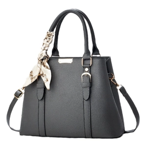 Dark grey pebble leather tote bag with gold hardware, top handle and decorative silk scarf