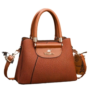 Brown faux leather handbag with wavy texture, gold hardware and detachable strap