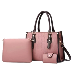 Pink 3-piece faux leather tote bag set with crocodile embossing and golden metal hardware