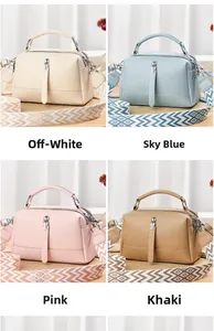 Litchi pattern crossbody bags in off-white, blue, pink, and khaki with wide straps