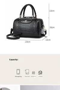 Internal capacity of crocodile texture handbag showing phone and cosmetics space