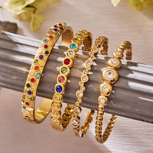 Set of four 18k gold plated geometric bangles with colorful zircon and crystal inlay