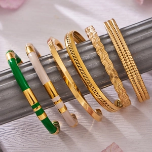 Elegant gold-plated stainless steel bangles with colorful enamel and geometric textures