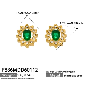 Detail of green emerald-style stud earrings with gold stainless steel and zircon halo