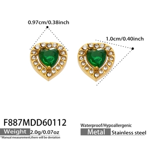 Detail of heart stud earrings with green zircon and gold stainless steel frame