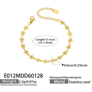 Detail of 18k gold plated stainless steel flower chain bracelet with blue enamel centers