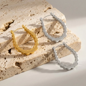 U-shaped wavy geometric earrings in polished stainless steel gold and silver set