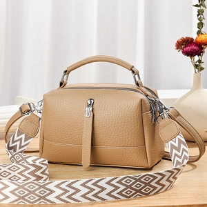 Chic khaki faux leather handbag with bohemian patterned wide shoulder strap and handle