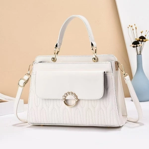 White quilted handbag with pearl-encrusted ring and gold hardware for women