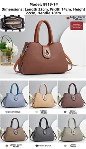 Detail view of large handbag showing internal structure and exact dimensions of 32x14x22cm