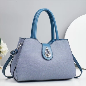 Stylish macaron blue crossbody handbag with twill texture and silver waterdrop clasp