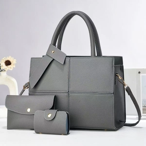 Three-piece dark grey pebbled leather handbag set with tote, pouch, and card holder