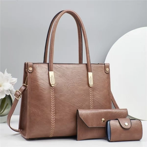 Three-piece women's tote bag set in coffee brown leather with stylish stitching