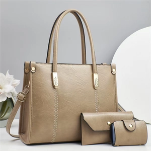 Three-piece women's khaki handbag set with golden leaf ornaments and textured faux leather