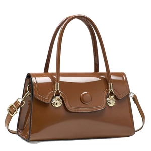 Brown patent leather shoulder bag with gold shell hardware and adjustable strap