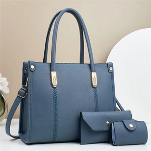 Three-piece dark blue lychee grain leather handbag set with tote and matching pouches