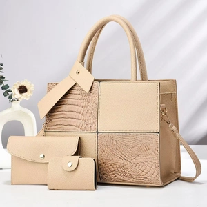 Three-piece beige tote bag set with crocodile texture and matching wallet