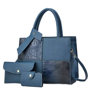 Three-piece set of navy blue faux leather bags featuring elegant crocodile texture panels