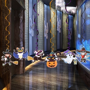Detail of Halloween hanging swirls with cartoon witch, ghost and pumpkin decorations