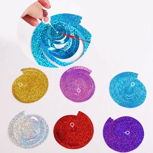 Detail of colorful PVC spiral swirl decorations with hooks for party ceiling hanging