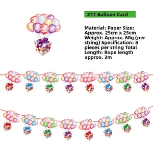 Detailed view of colorful paper banner with balloon and gift patterns for party decor