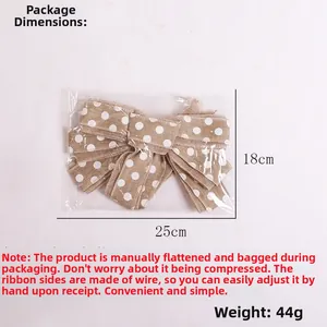 Detailed view of burlap polka dot bow packaging size 25x18cm with wired edges for styling