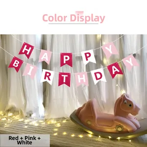 Detail of Happy Birthday banner with swallowtail flags in red pink and white colors