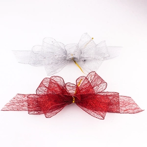 Sparkly mesh bow decorations in silver and red colors for wedding and party decor