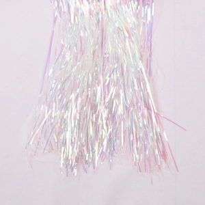 Close-up of iridescent tinsel fringe curtain showing colorful pearlescent laser texture