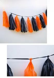 Detail view of orange and black Halloween tassel garland with knots and paper texture