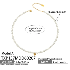 Detail of beaded pearl necklace with gold sphere pendant and adjustable stainless steel chain