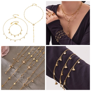 Detail von vergoldeter Stern-Halskette und Dreiecks-Armband-Set mit Zirkonia-Steinen