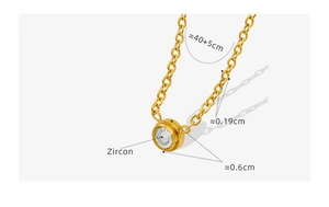 Detail of 18K gold titanium necklace showing the 0.6cm zircon pendant and 40cm chain size