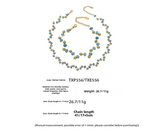 Detail of beaded jewelry set featuring gold stainless steel beads and blue gemstones