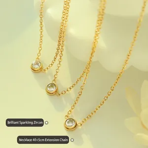 18K gold plated titanium necklace with cubic zirconia solitaire pendant and adjustable chain