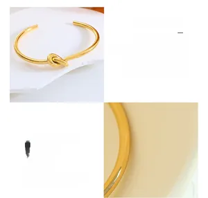 Dettaglio del bracciale a nodo in acciaio al titanio placcato oro 18K lucido