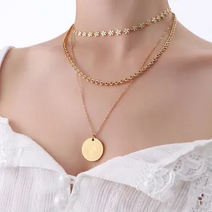 Three-layer layered necklace set with Queen Elizabeth coin pendant and blue floral choker