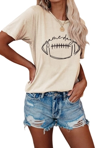 Detail of Game Day graphic print on beige short sleeve t-shirt with football pattern