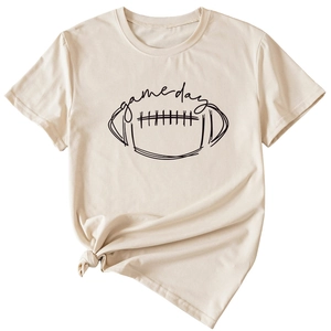 Close-up of cream Game Day t-shirt featuring a football graphic and side knot detail