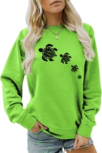 Detail of lime green crewneck sweatshirt showing ribbed cuffs and black turtle print