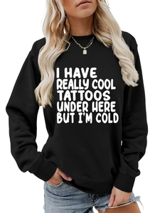 Front detail of black cotton sweatshirt featuring bold white COOL TATTOOS graphic print