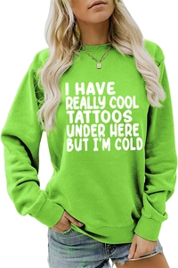 Detail of green crewneck sweatshirt with white I HAVE REALLY COOL TATTOOS text print