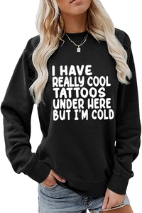 Detail of black crewneck sweatshirt with white funny text print on soft cotton fabric