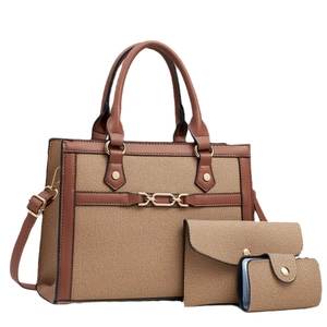 Brown canvas three-piece handbag set with tote bag, clutch and card holder