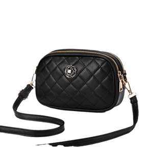 Elegant black quilted PU leather crossbody camera bag with camellia flower metal charm