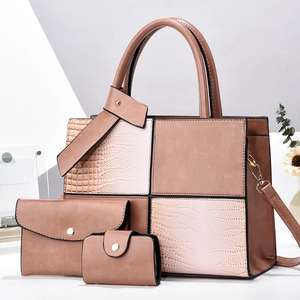 Detailed close-up of 3-piece set featuring tote, clutch and card holder in nude pink PU