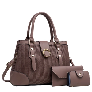 Three-piece brown striped handbag set with large tote, clutch, and card holder
