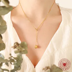 Minimalist Y-shaped 18K gold plated necklace featuring a geometric ball pendant for women